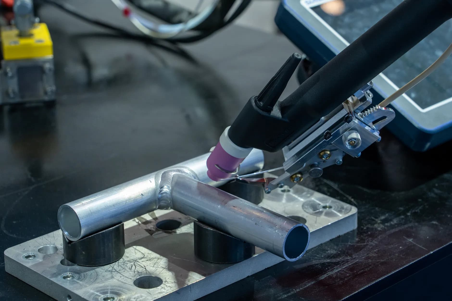 Metal finishing work on an industrial bench